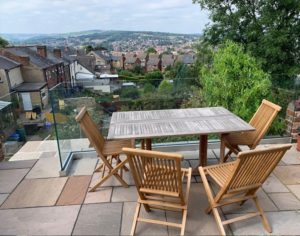 Raised Patio With Glass Balustrade