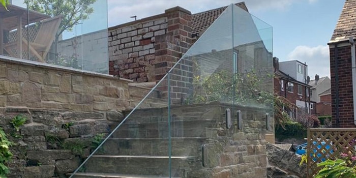 frameless glass balustrade on staircase in residential garden
