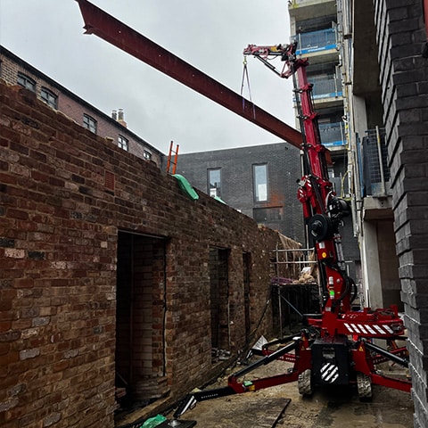 craning steel beam into position