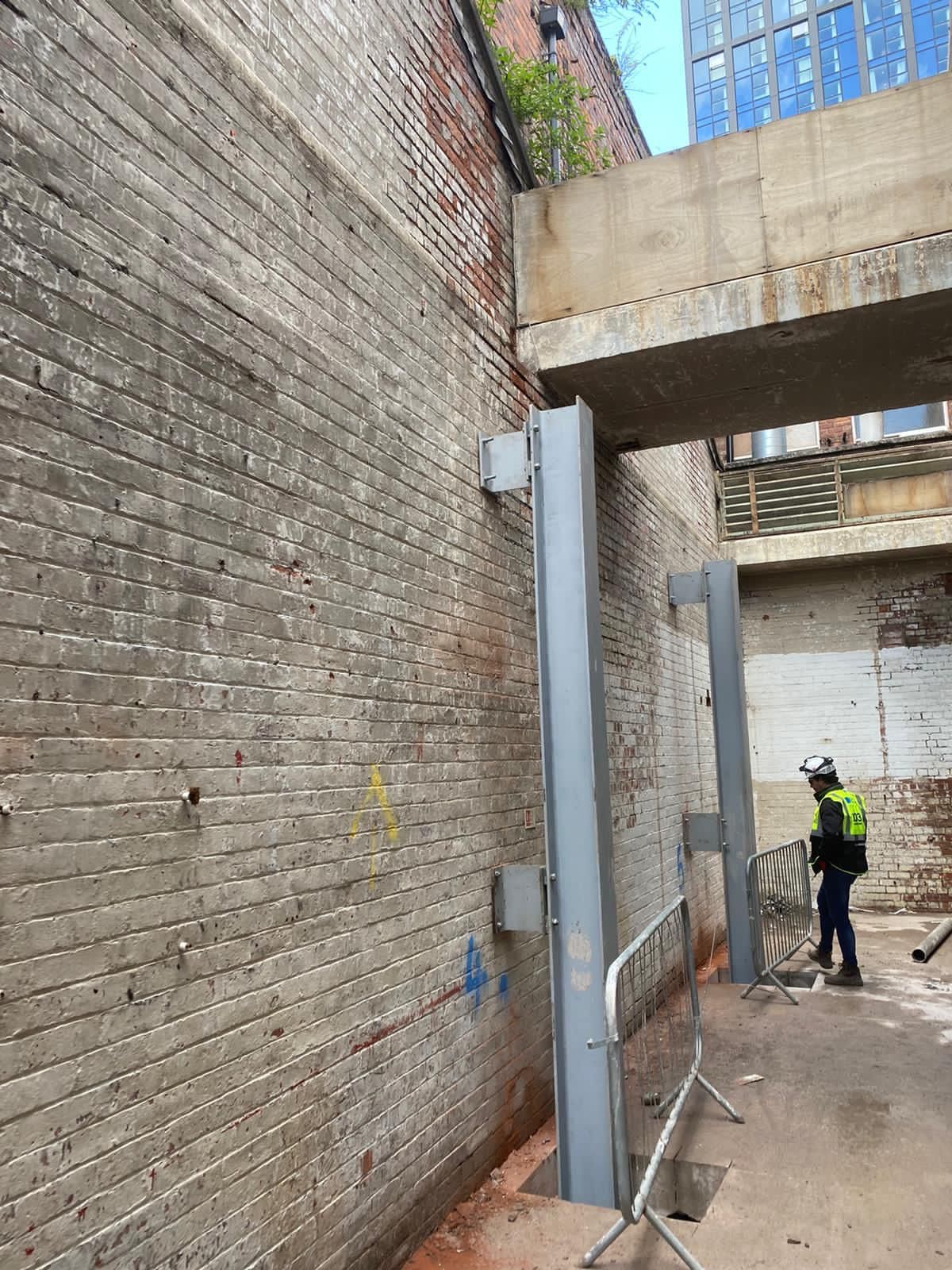 supporting steel beams against wall manchester