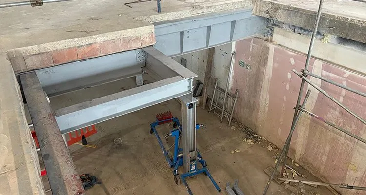installing steel beams in shopping center brighton