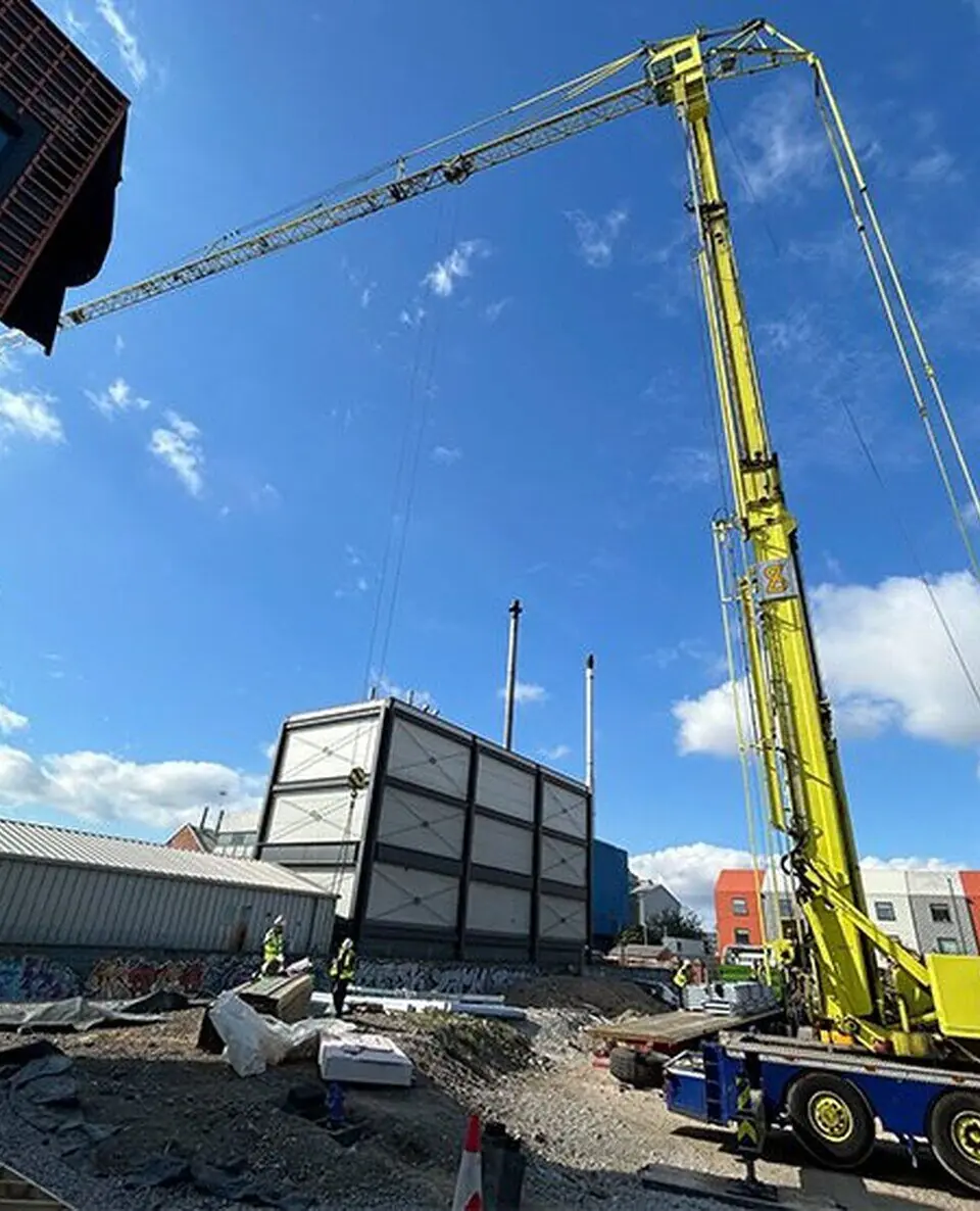crane lifting steels into place leeds