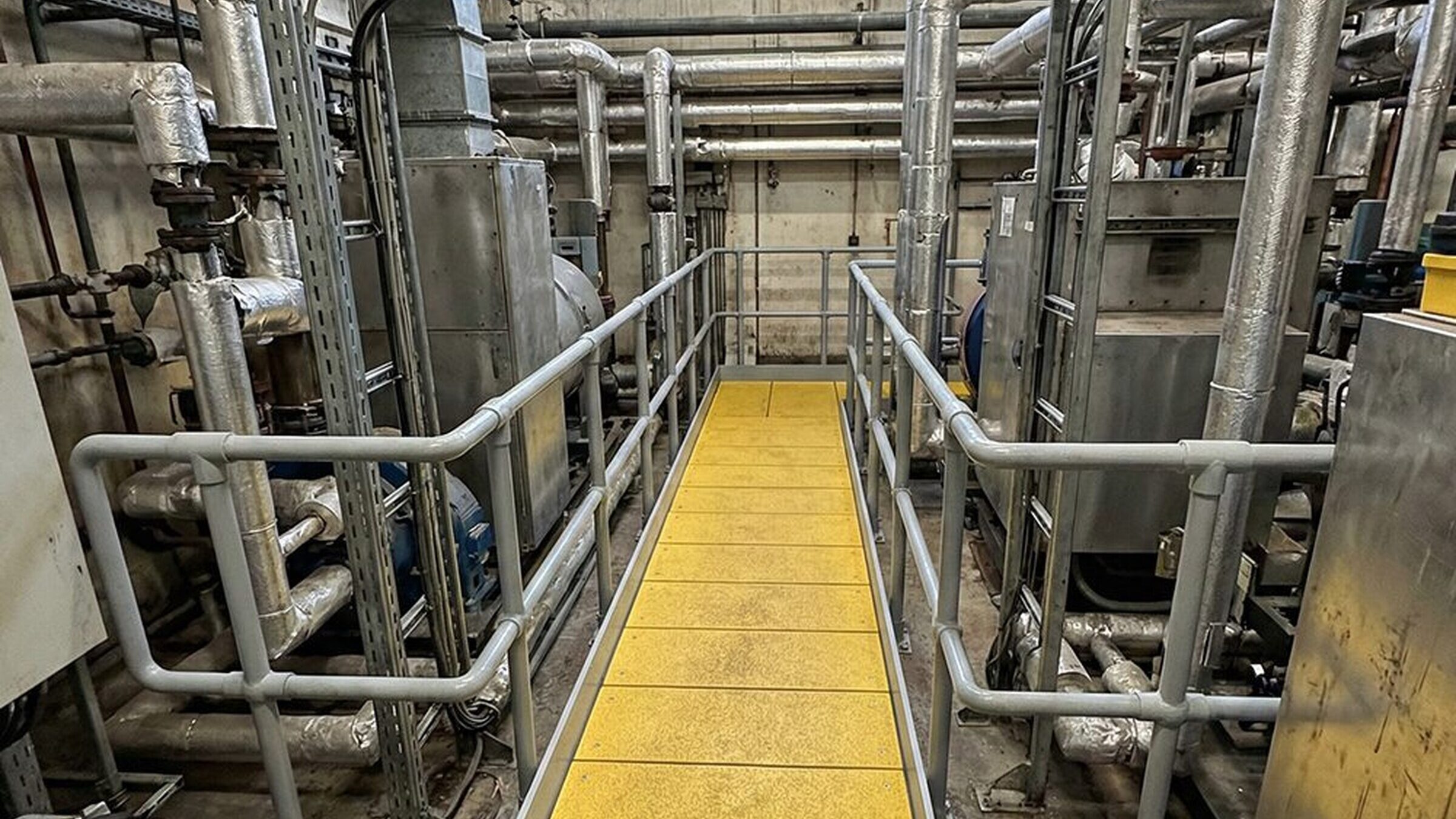 GRP flooring installed across a busy factory floor