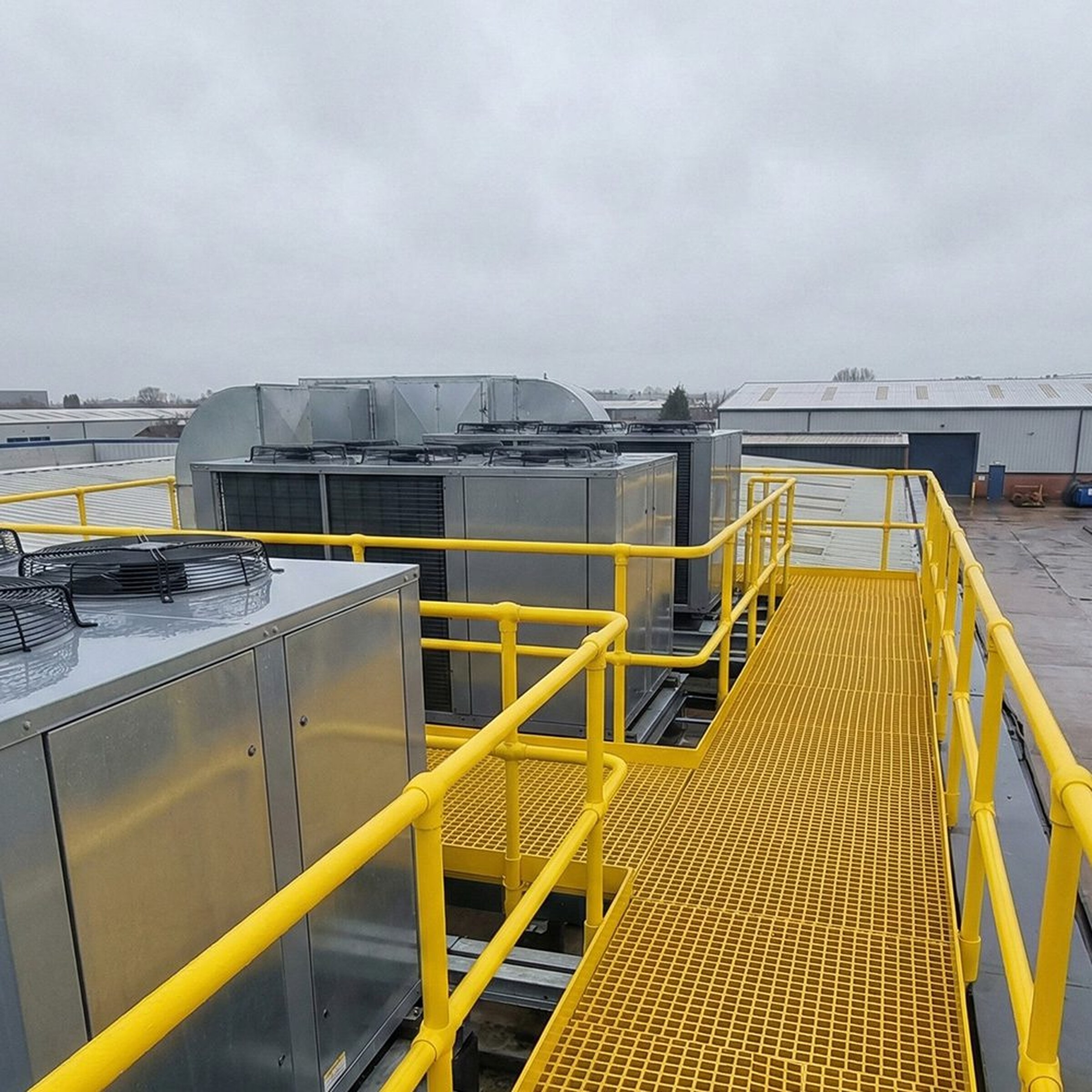 Clear width between guardrails on a rooftop GRP access platform