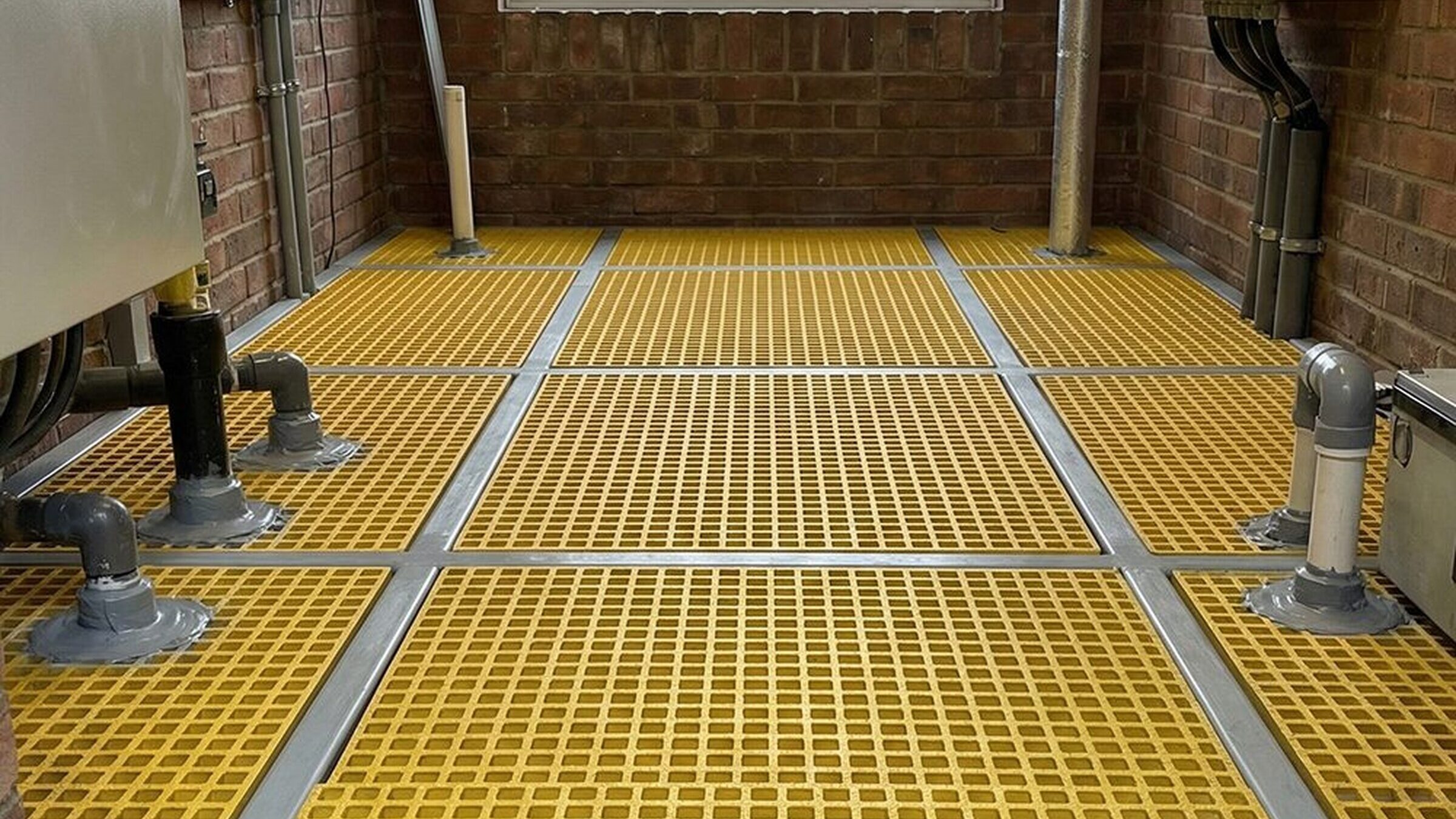 Completed GRP riser flooring over a service void