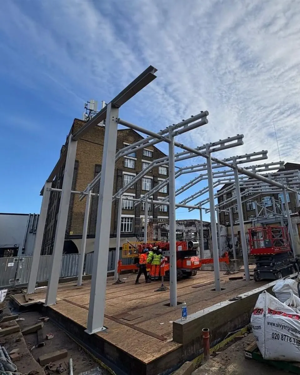 large portal frame building erection london december 2025